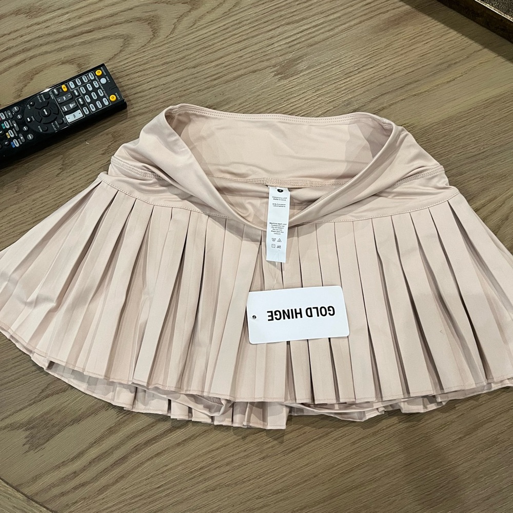 Gold hinge tennis skirt